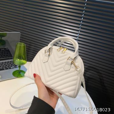 Handheld shell bag single-shoulder messenger bag