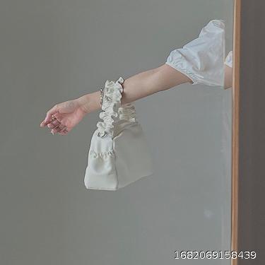 Solid soft leather hand pleated bag Spring/Summer new niche simple and fashionable versatile one shoulder crossbody bag