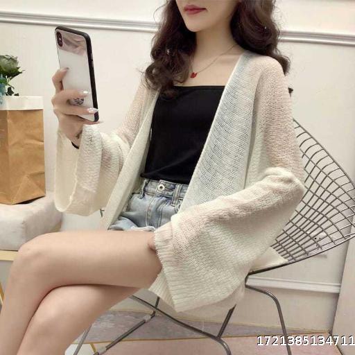 Thin air conditioning cardigan hollow-out knit summer female Korean version loose students lazy wind short sunscreen coat