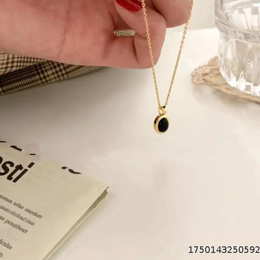 Vintage gold rimmed onyx necklace for women