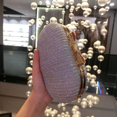 Evening bag pleated butterfly head goose egg round clutch